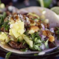 Asada Taco · Steak, onion, cilantro, corn tortilla