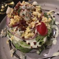 Wedge Salad · Gluten free. Baby iceberg lettuce, applewood smoked bacon, crumbled point reyes bleu cheese,...