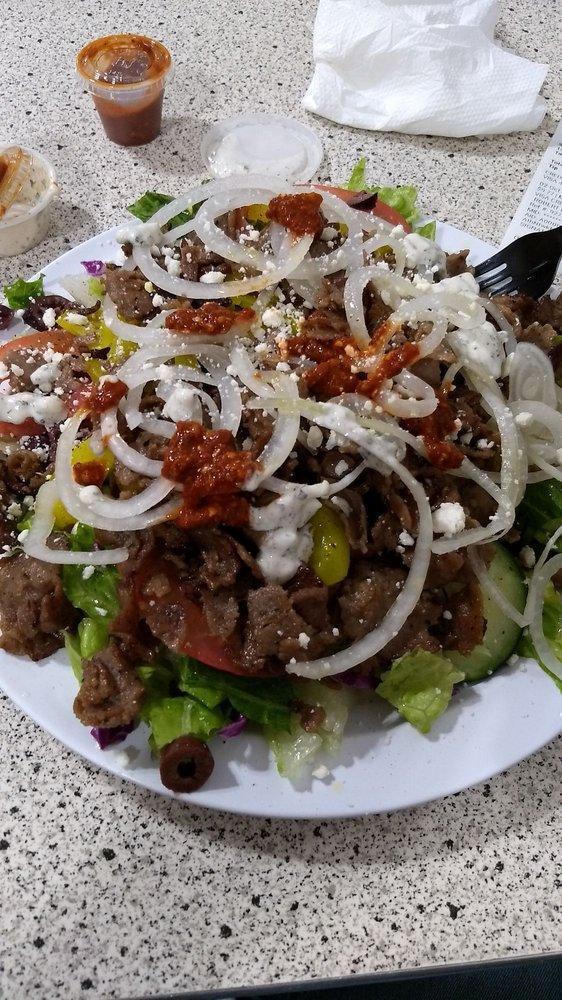 Greek Salad Platter · Salad, Tomato, Cucumber, Olives, Banana Pepper, Viniger, Olive Oil, Onion, Feta Cheese, Sumac