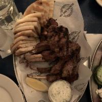 Lamb Chops · Charcoal grilled and marinated with Greek salt and extra virgin olive oil.