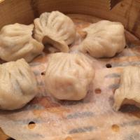 Steamed Shrimp Dumplings · 6 pieces. Stuffed dough. 