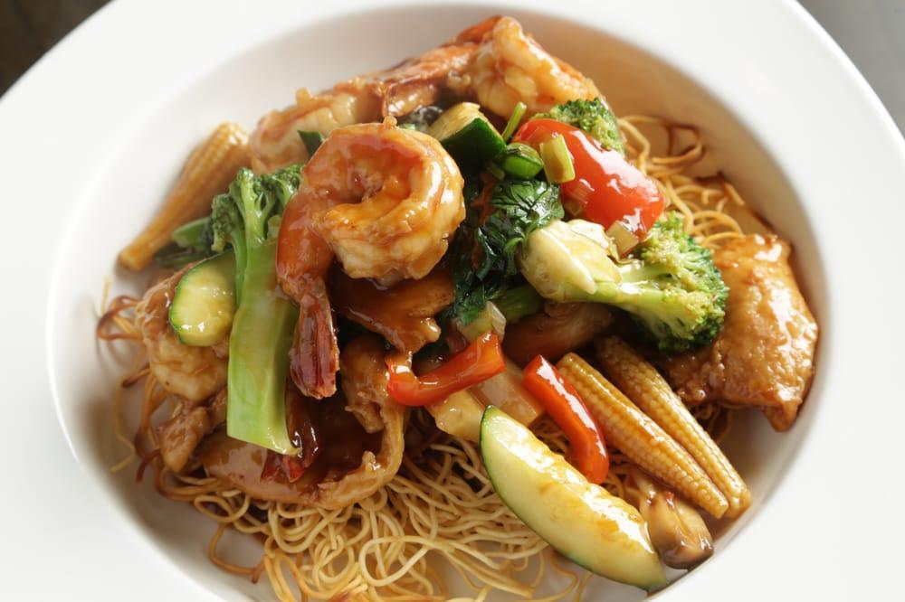 Crispy Pan Fried Noodle · Hot and spicy. Thin wonton noodle.