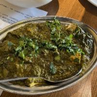 Palak Paneer · Homemade cheese cubes cooked with fresh chopped spinach and herbs. Served with basmati rice....