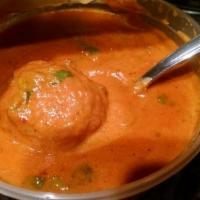 Malai Kofta · Mixed vegetable balls cooked in mildly spiced creamy sauce. Served with basmati rice. Gluten...