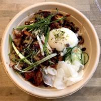 Tokyo · Grilled chicken, scallions, furikake, mushrooms, radishes, poached egg, cucumber salad and s...