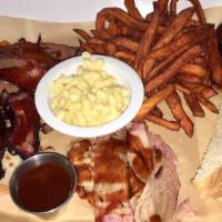 Combo Platter · 1/4 brisket, 1/4 pork, 1/4 baby back with 2 small sides.