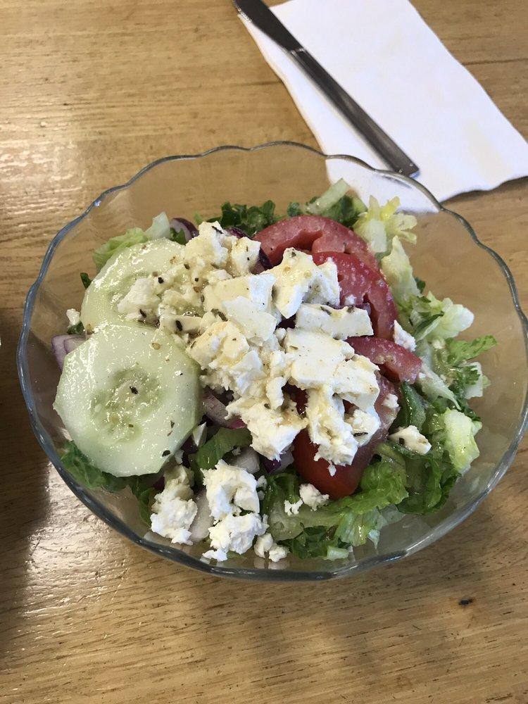 Greek Salad · Romaine lettuce, tomato, onion, feta cheese, cucumber, olives, pepperoncini and grape leaves. Add chicken, shrimp, steak for an additional charge.