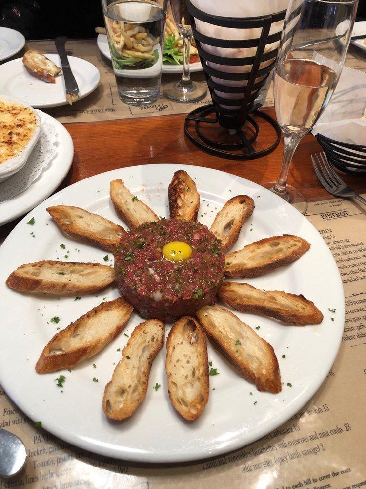Beef Tartare and Dijon Mustard · Capers, shallots, quail egg and toast points.