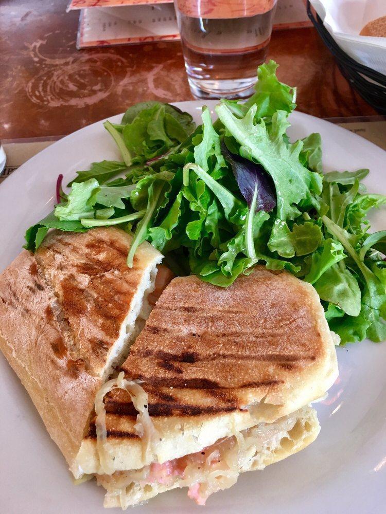 Smoked Salmon Panini · Fines herbes, creme fraiche, capers and caramelized onions. Served with salad.