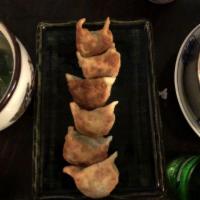 Pork Dumplings in Chili Oil (8) . · 