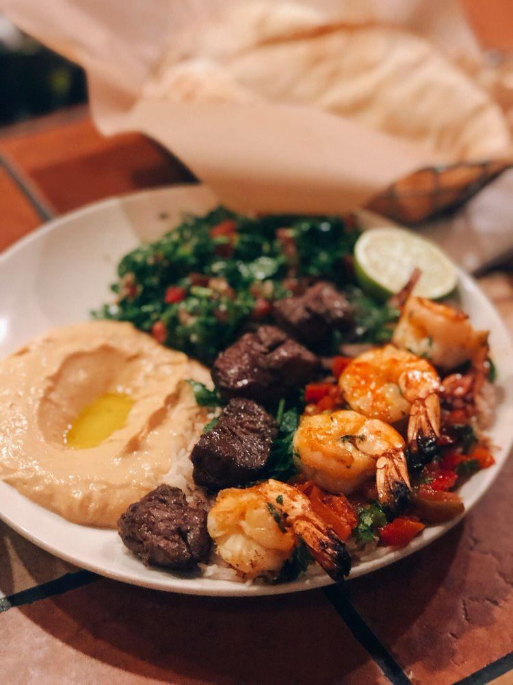 Spicy Hummus · Hummus, roasted chili, extra virgin olive oil (VG VN GF). Served with pita.