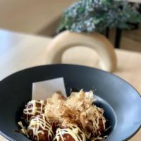 Takoyaki · Octopus balls is our ball-shaped Japanese snack made with wheat flour-based batter filled wi...