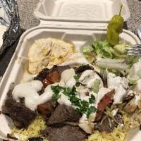 Beef Shawarma Plate · Beefsteak marinated with a special blend of Lebanese seasoning. Served over rice side of sal...