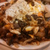 Skirt Steak Skillet · Tender steak, green peppers, mushrooms, onions, choice of cheese. Skillets are layered with ...