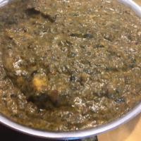 Palak Paneer · Homemade cheese cooked in pureed spinach with onion curry sauce. No Peanut. Vegetarian.