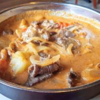 Massaman Curry · Potatoes, carrots, onions, and peanuts in a rich flavored Thai massaman curry. No substitute. 