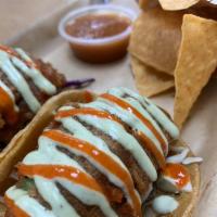 Beer Battered Avocado Tacos · 2 street taco sized tacos per order. Beer battered avocado on a bed of purple and green cabb...