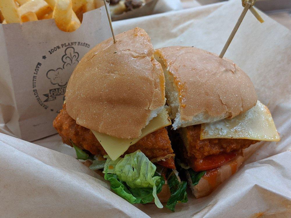 Crispy Chicken Sandwich · Fried chicken, lettuce, tomato and chipotle aioli. Served with fries.