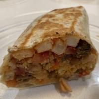 California Burrito · Plant-based steak, Spanish rice, beans, pico de gallo, guacamole and fries wrapped in a flou...