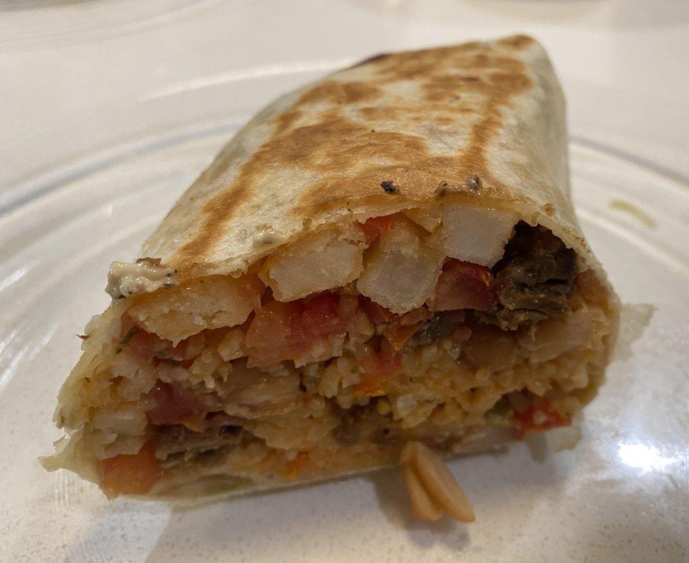 California Burrito · Plant-based steak, Spanish rice, beans, pico de gallo, guacamole and fries wrapped in a flour tortilla. Served with chips. Gluten free salad available upon request.