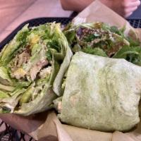 Caesars Envy Wrap · Blacked chicken, quinoa, corn, edamame, lettuce and chipotle dressing wrapped in a spinach t...