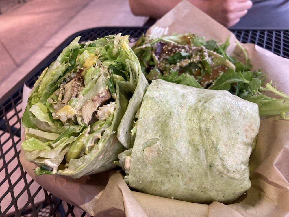 Caesars Envy Wrap · Blacked chicken, quinoa, corn, edamame, lettuce and chipotle dressing wrapped in a spinach tortilla. Served with chips. Gluten free salad available upon request.