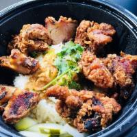 Fried Chicken Rice · Marinated and deep fried chicken over chicken rice. (chicken rice