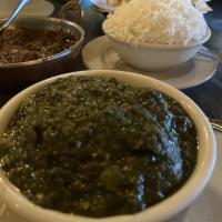 Saag · Pureed spinach leaves with onions, ginger and green chills. Vegan. Vegetarian. Gluten free.