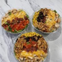 Chicken Bacon Ranch Salad · made with romaine lettuce, diced chicken breast, bacon, tomato, Mexican blend cheese, and cr...