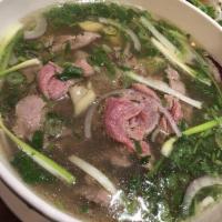 Pho Tai · Rare slice of filet steak with rice noodle soup.