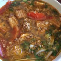 Bun Rieu Cua · Vietnamese crab meat and tomato noodle soup. Rice vermicelli, crab meat mixed of crab and me...