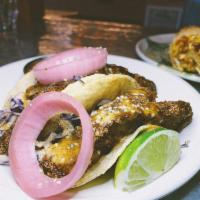 Crispy Chayote Fish Tacos · Hemp and flax seed battered chayote squash, chipotle almond butter, pickled red onion. Spicy...