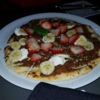 Nutella Pizza to Share · Mascarpone cheese, walnuts, strawberries and bananas.