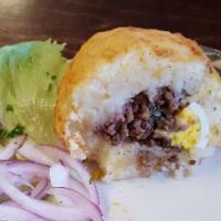 Papa Rellena · A deep fried mash potato croquette. Stuffed with seasoned beef, green onions, egg, and olive...