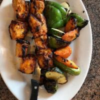 Shish Tawook · Gluten free. Marinated and char-broiled chicken breast kabobs. Served with choice of 2 sides.
