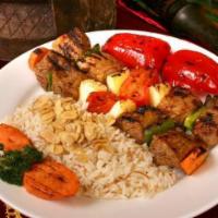 Shish Kabob · Gluten free. Tender kabobs marinated and char-broiled. Served with choice of 2 sides.