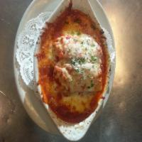 Lasagna · Layers of wide ribbon egg noodles and ricotta cheese, all baked in a rich sauce with sweet f...
