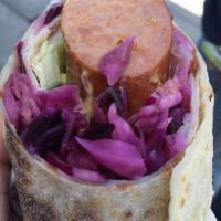 Polse Wrap · Smoked sausage with Norwegian coleslaw, dill mustard, and pickled onions and cucumbers wrapp...