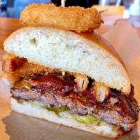 Lockhart Legend Burger · Applewood smoked bacon, cheddar cheese, Dr Pepper BBQ sauce, 2 onion rings & sliced dill pic...