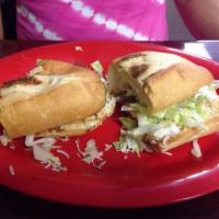 Torta · Deli Style Roll filled with Lettuce, Tomatoes, Avocado, Cheese and Choice of Meat. 