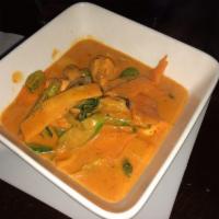 Red Curry · Smooth creamy coconut milk, is matched with hot fiery red chili paste, bamboo shoots, basil,...