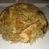 Spicy Basil Fried Rice · Playfully spiced up fried rice with egg, fresh onions, bell peppers, basil and carrots. Spicy.