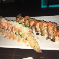 Hurricane Roll · Shrimp tempura, eel, kani and avocado inside and topped with seared spicy salmon with chef's...