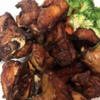 Cambodian Style Crispy Fried Chicken · Bone-in chicken marinated in a special seasoning, then crisp fried and served with sweet sau...