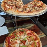 BBQ Chicken and Bacon Pizza · Chicken, mushrooms, onion, bacon and BBQ sauce.