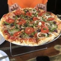 Veggie Pizza · Green bell pepper, mushroom, olives, onion and tomato.