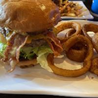 Hickory BBQ Burger · Beer battered onion rings, crisp bacon, cheddar cheese, lettuce, tomato, pickle and hickory ...