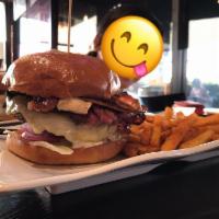 Monster Burger · Baked pastrami, turkey, crisp bacon, Swiss cheese, lettuce, tomato, red onion, pickle and ma...