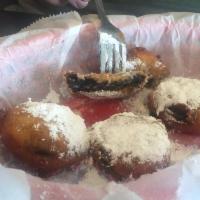 Fried Oreos · Battered and deep fried, like a funnel cake with an oreo surprise in the middle. ( 4 each or...