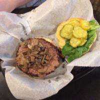 Buffalo Burger · Leaner and meaner than ground beef, Bison patty comes on a toasted onion roll. Served on a t...